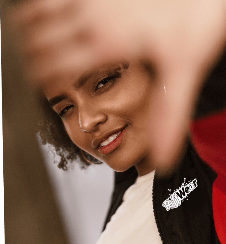 Femail athlete squinting towards the camera.